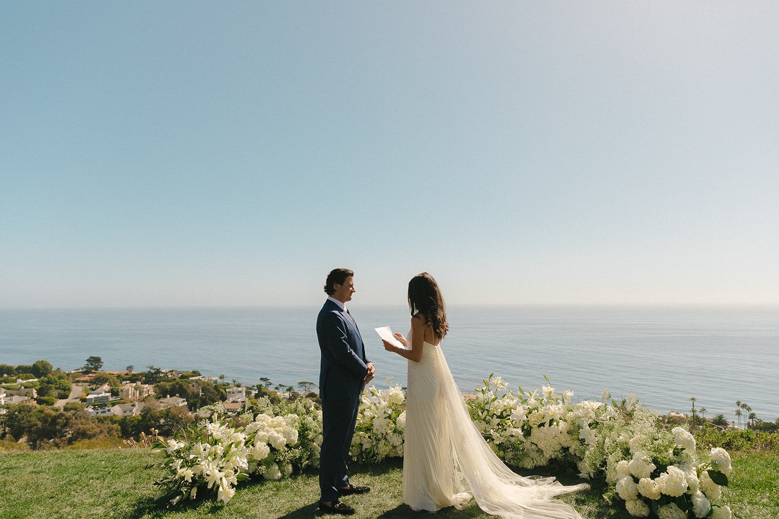A bride and groom doing their private vows at malibu sea view estate