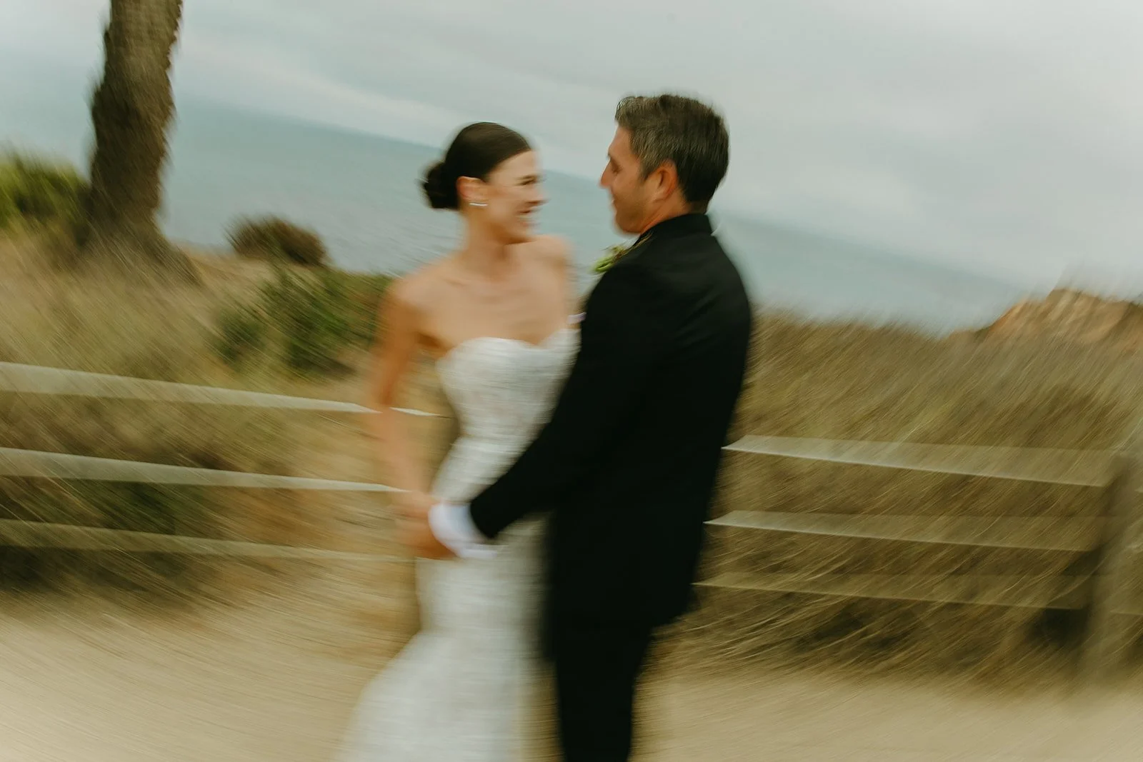 A blurry wedding photo of a bride and groom