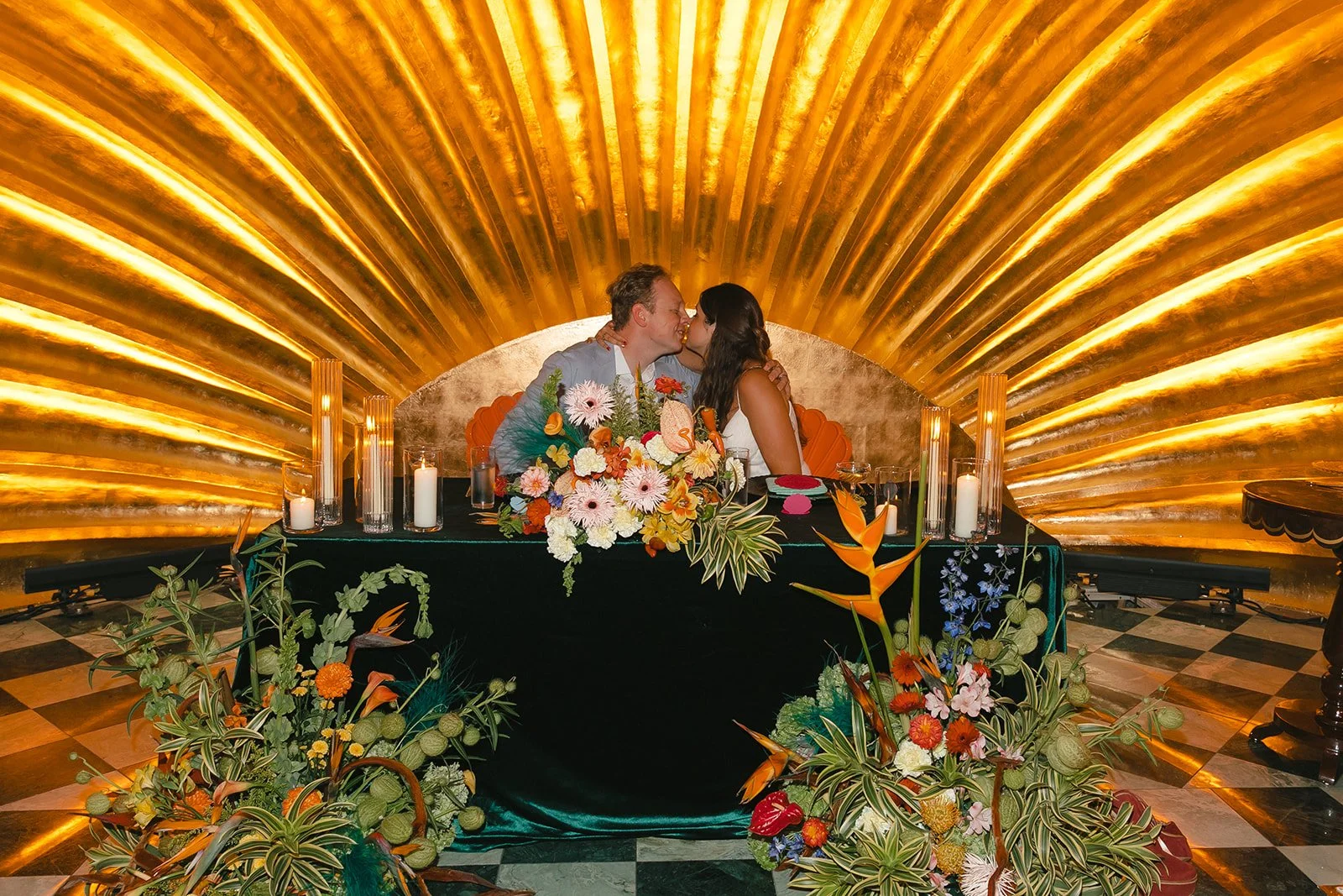 A bride and groom at their sweetheart table