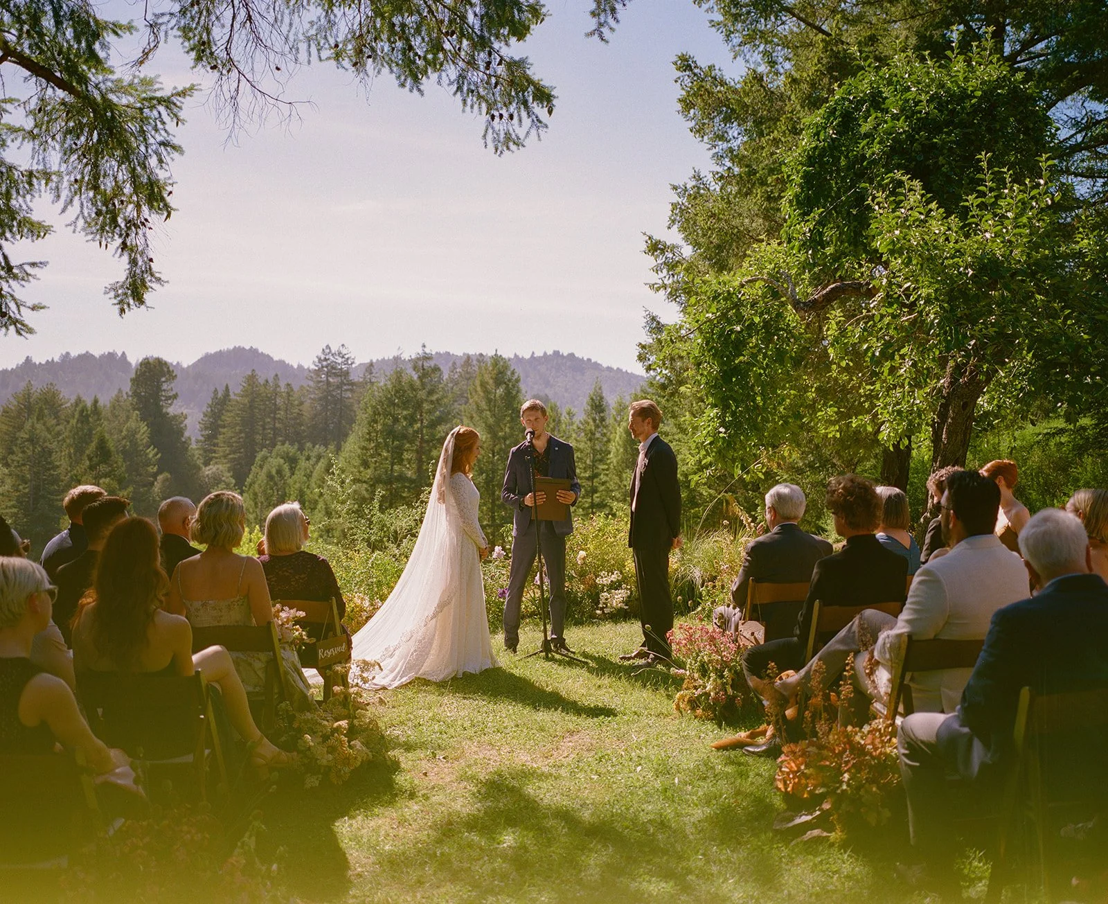 A bride and groom during their garden wedding ceremony