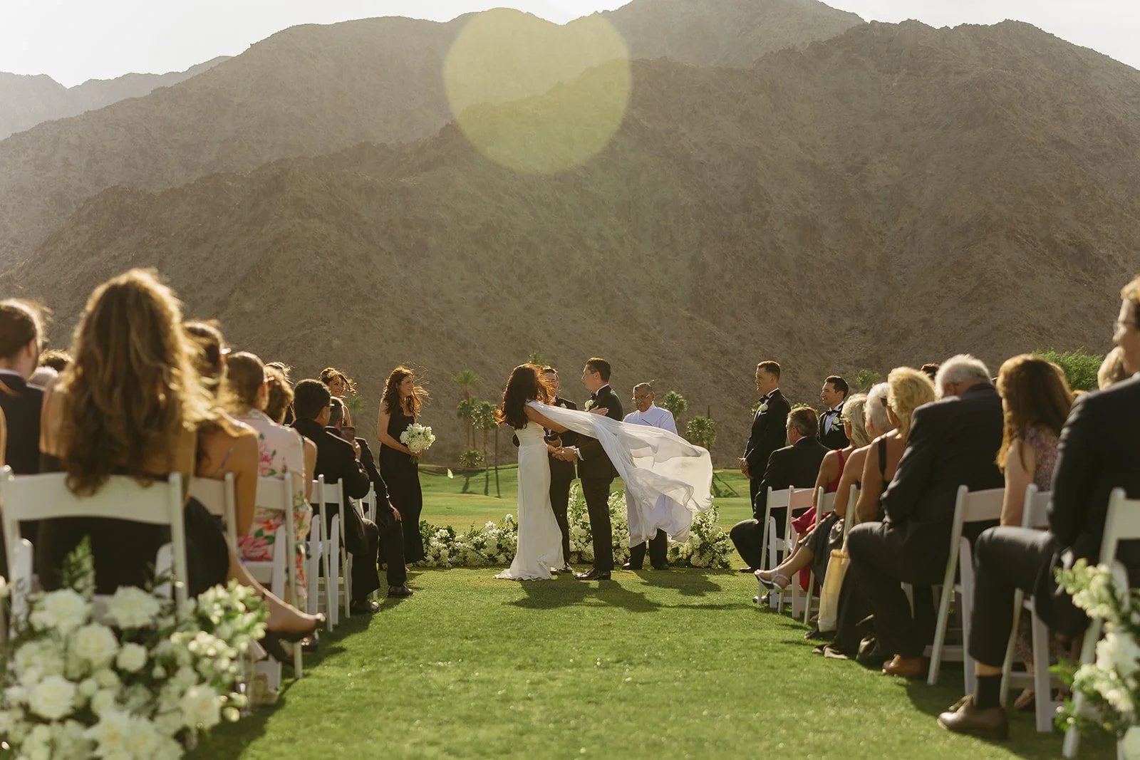A bride and groom during a wedding ceremony at a Palm Springs wedding venue