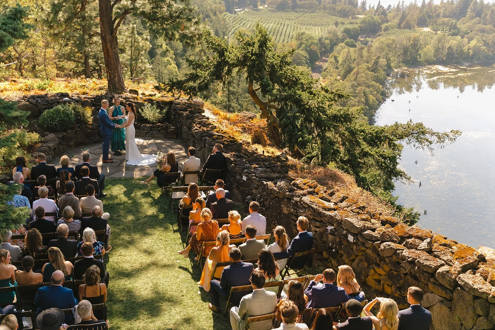 An outdoor wedding ceremony with an ocean view