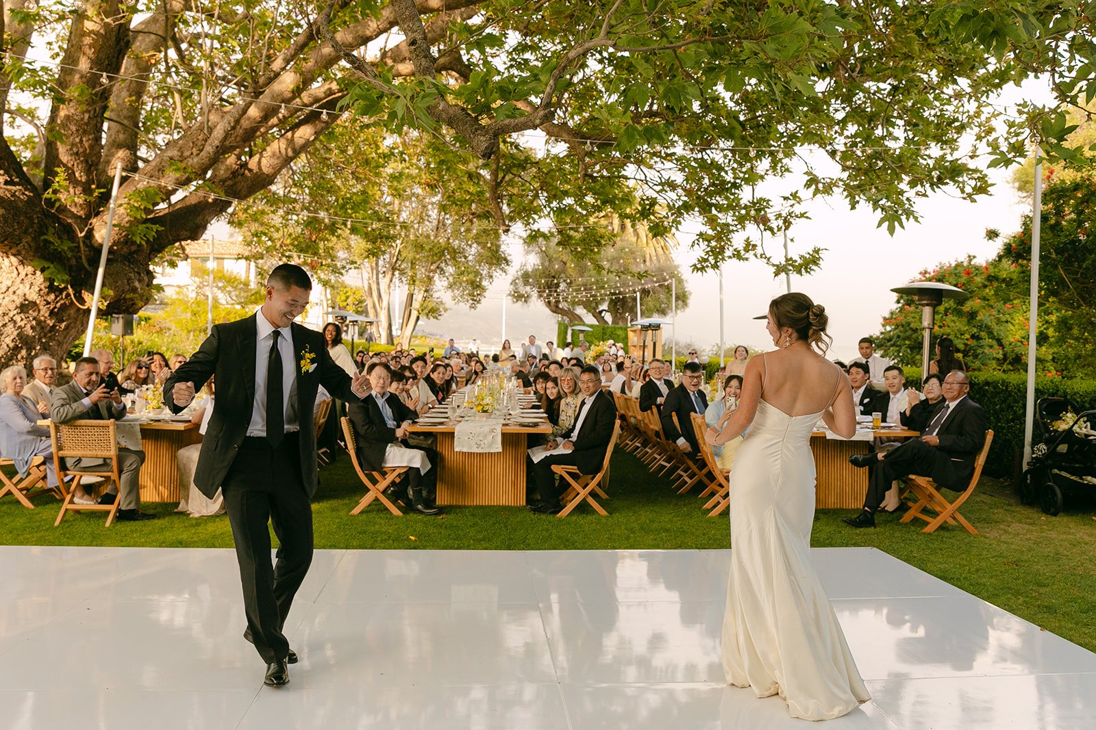 A bride and groom on the dance floor at their wedding
