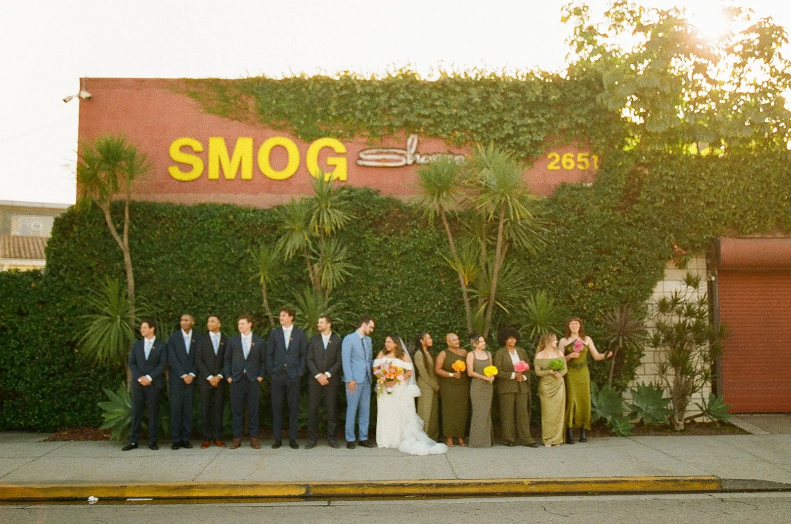 A wedding party on film at smogshoppe