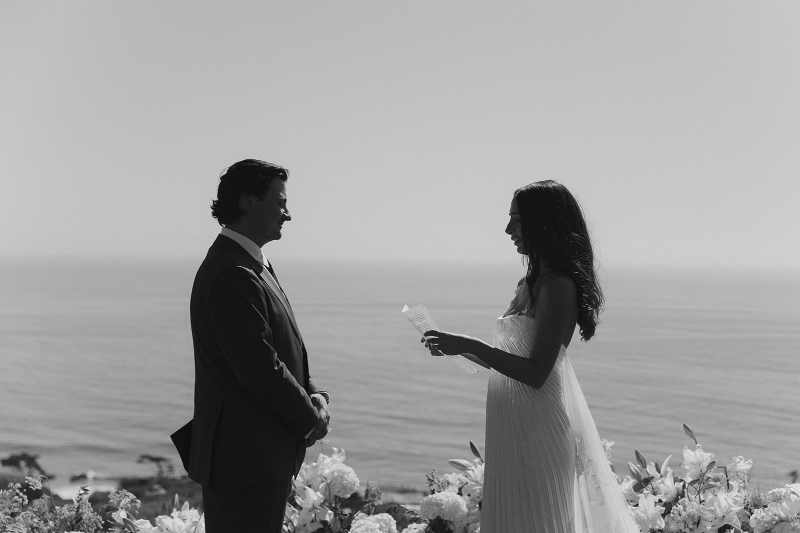 A bride and groom doing their private vows