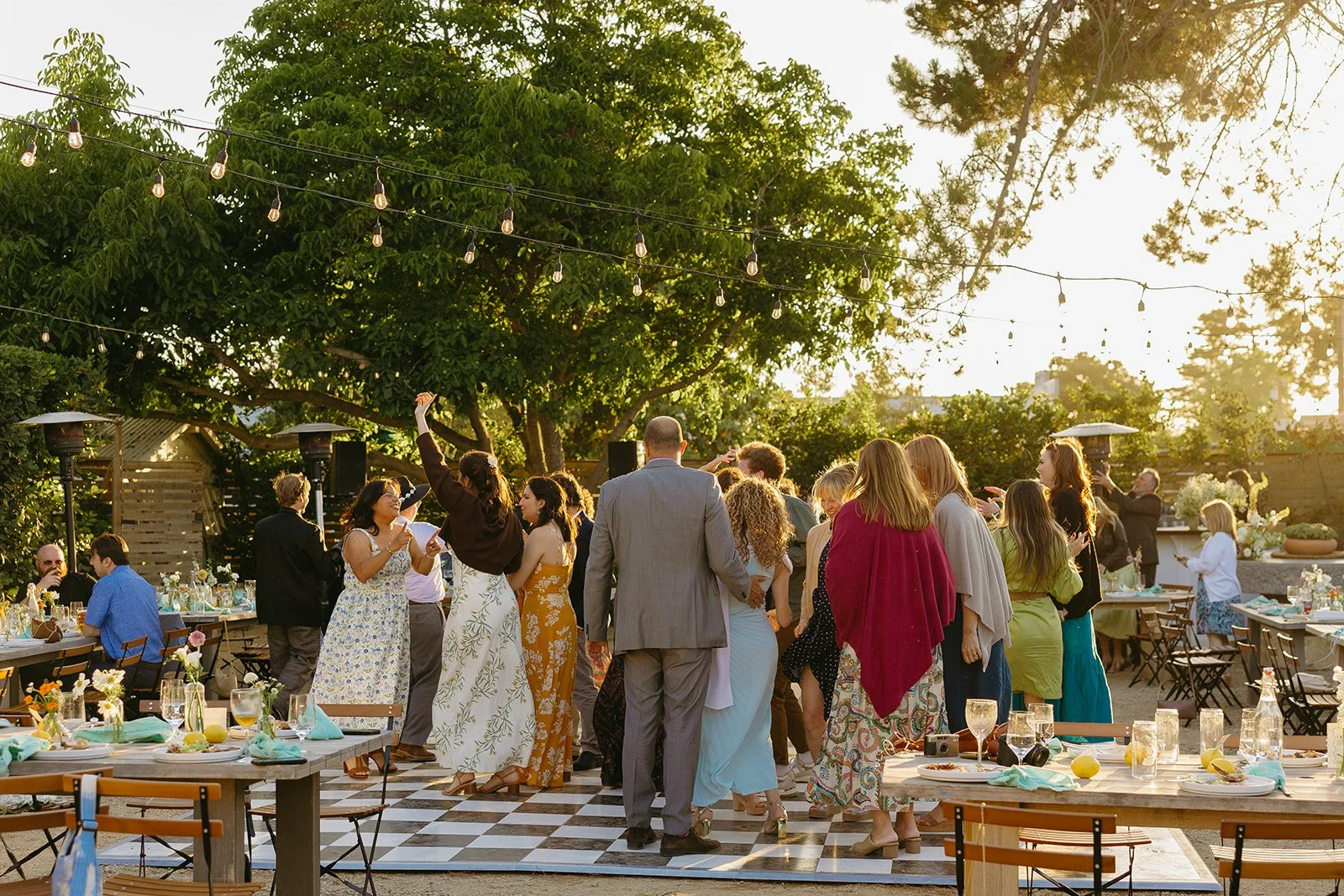 Wedding guests dancing at a small wedding reception