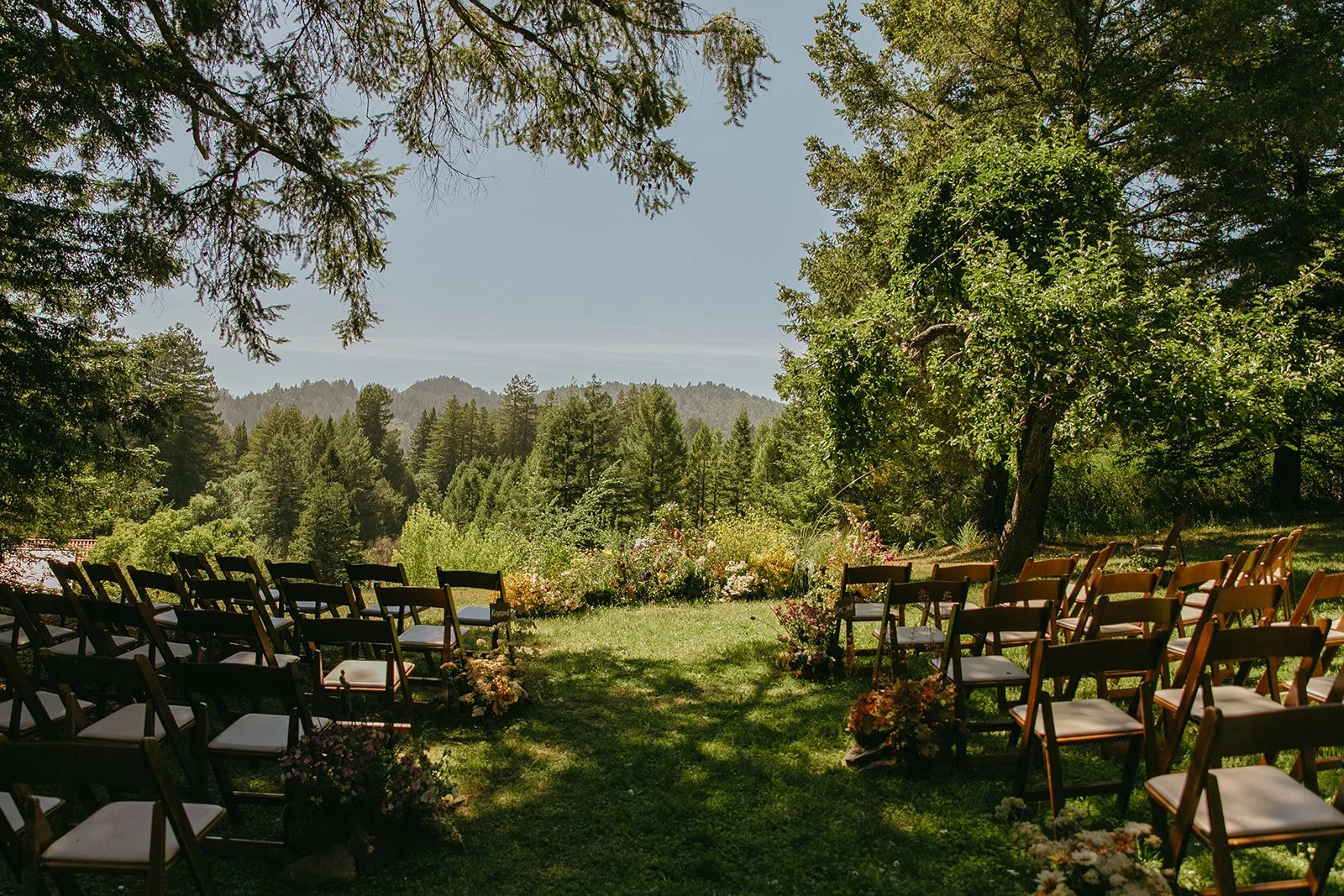 A wedding ceremony setup outdoors for a garden wedding