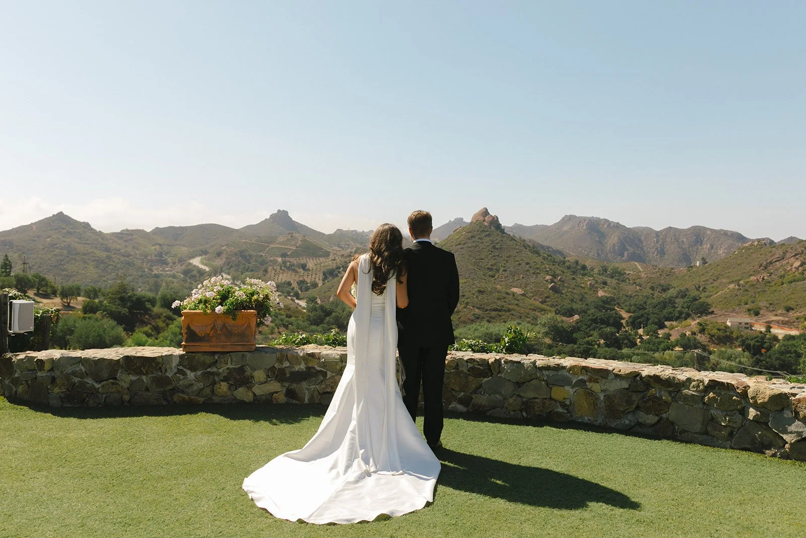 A couple looking out at the views from Cielo Farms