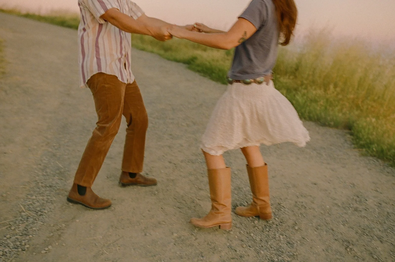 A couple dancing in their Laguna Beach engagement photos