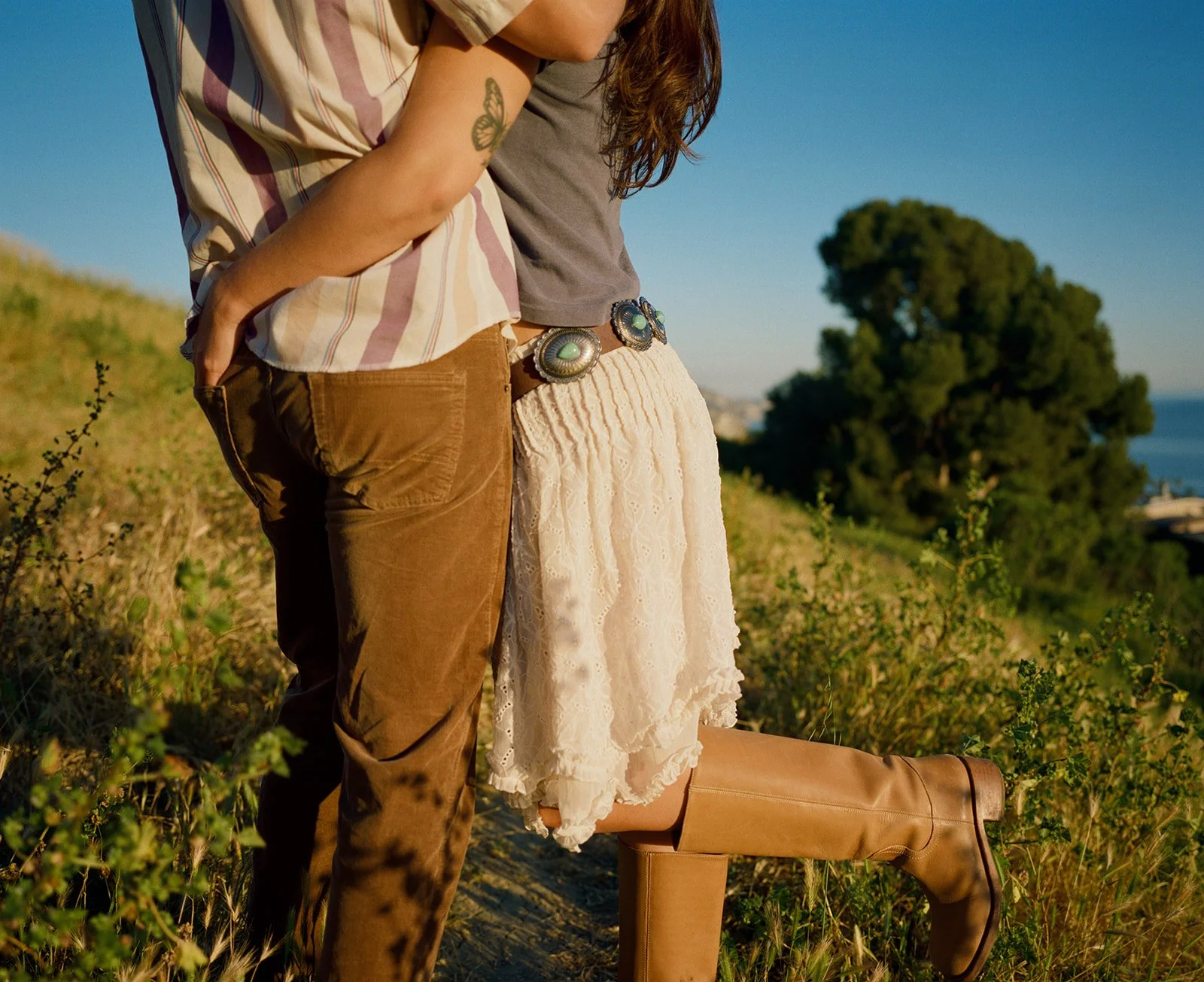 A couple hugging in film engagement photos