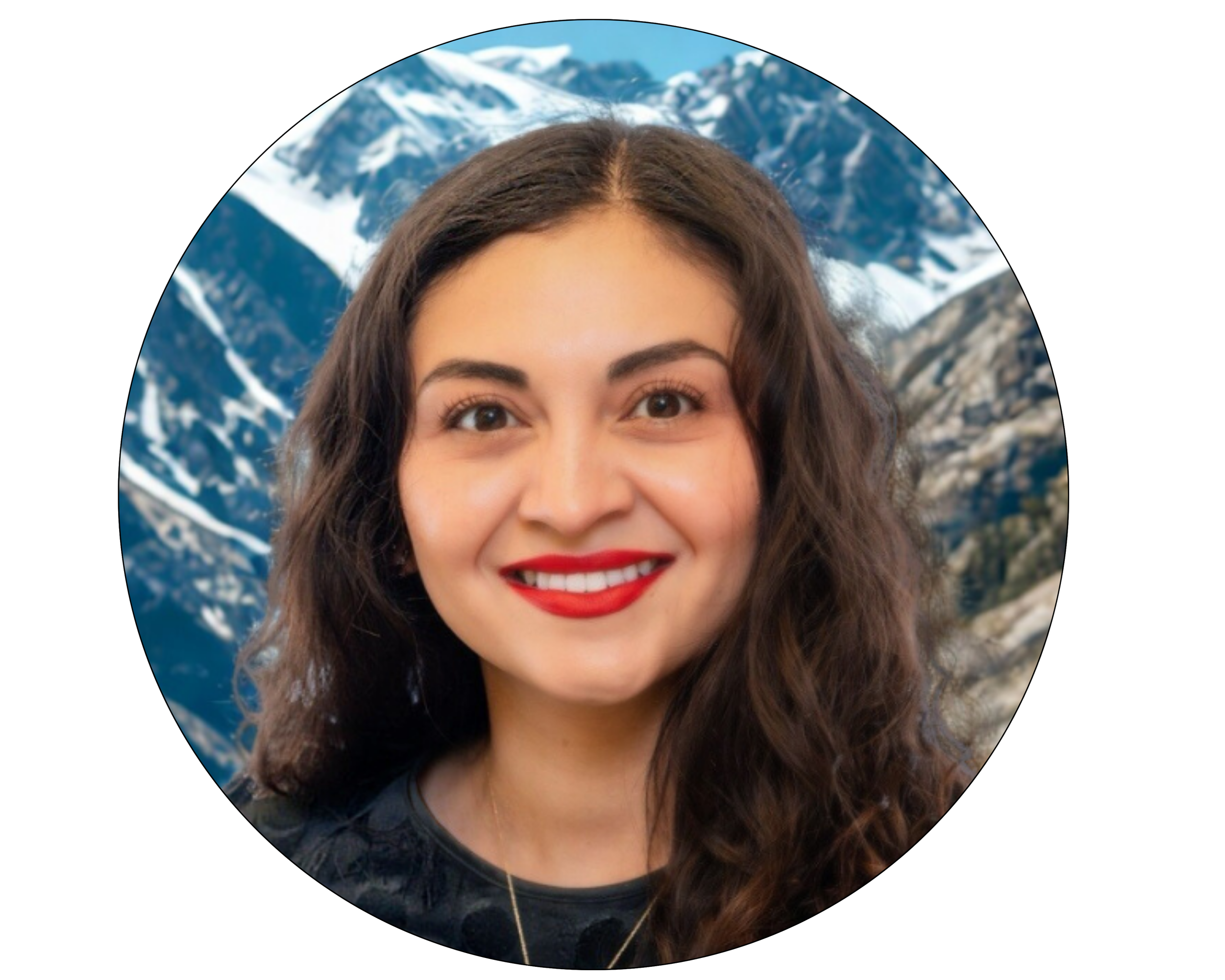 A woman with long brown hair and a black blazer smiling outdoors with mountain scenery in the background.