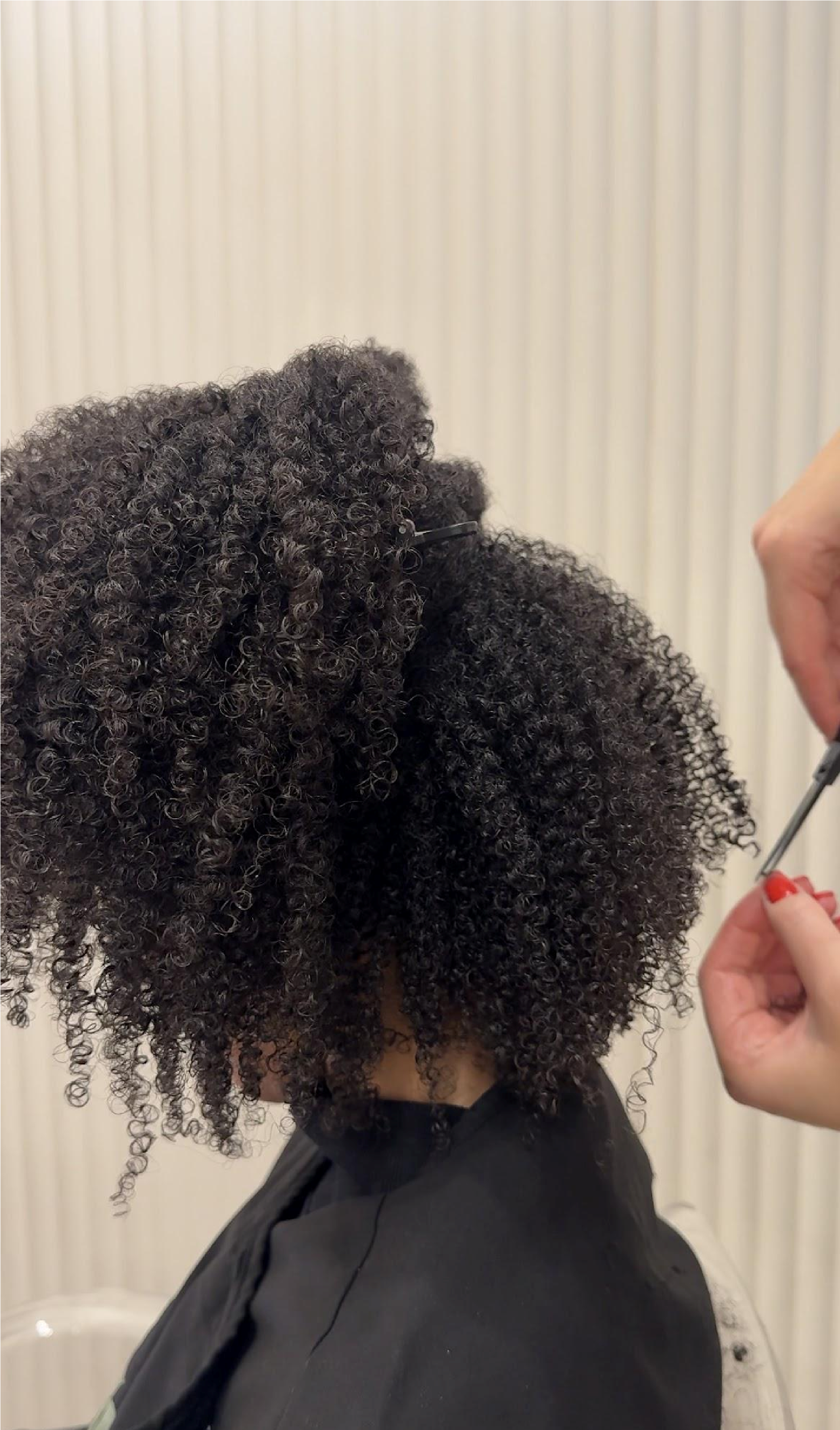 Dry cutting tightly coiled afro hair in its natural state at Thriv Cardiff
