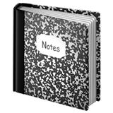 A black and white ruled notebook with a label reading 'Notes' on the cover.