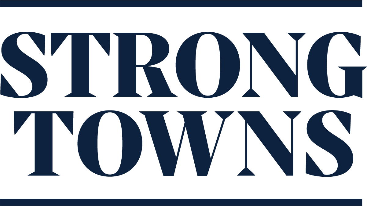 The words "Strong Towns" in large dark blue letters on a black background.
