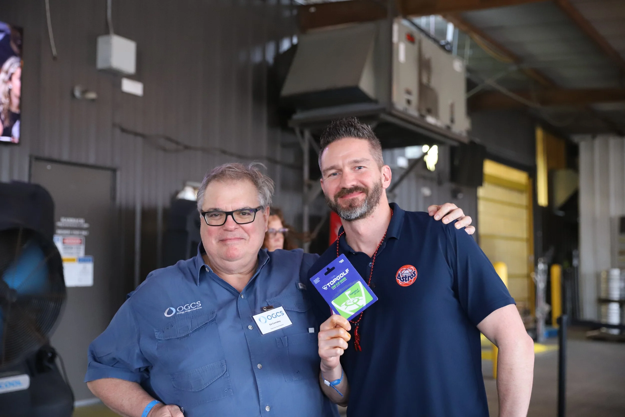 Crawfish 2026 Ed with raffle winner man beard.JPG