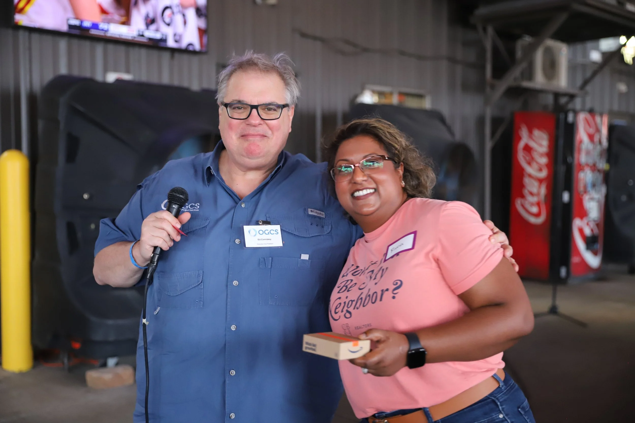 Crawfish 2026 Ed with raffle winner pink shirt.JPG