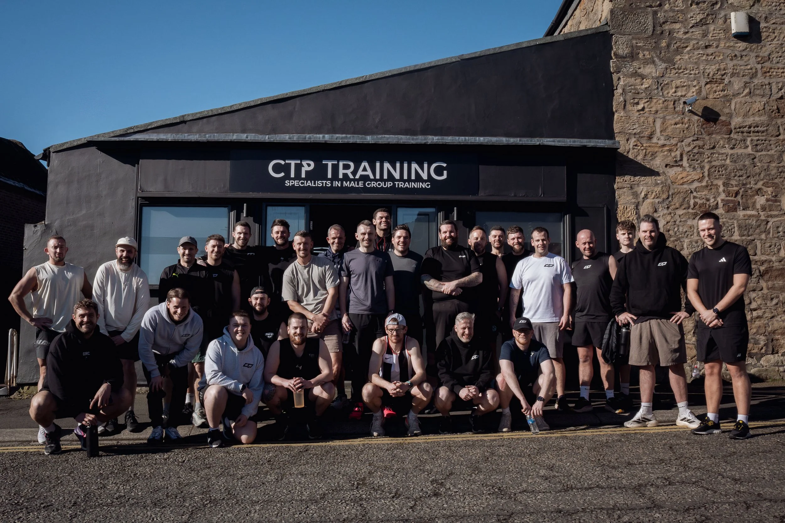 CTP Training members and coaches outside the gym in Morpeth, Northumberland, specialists in male group training.