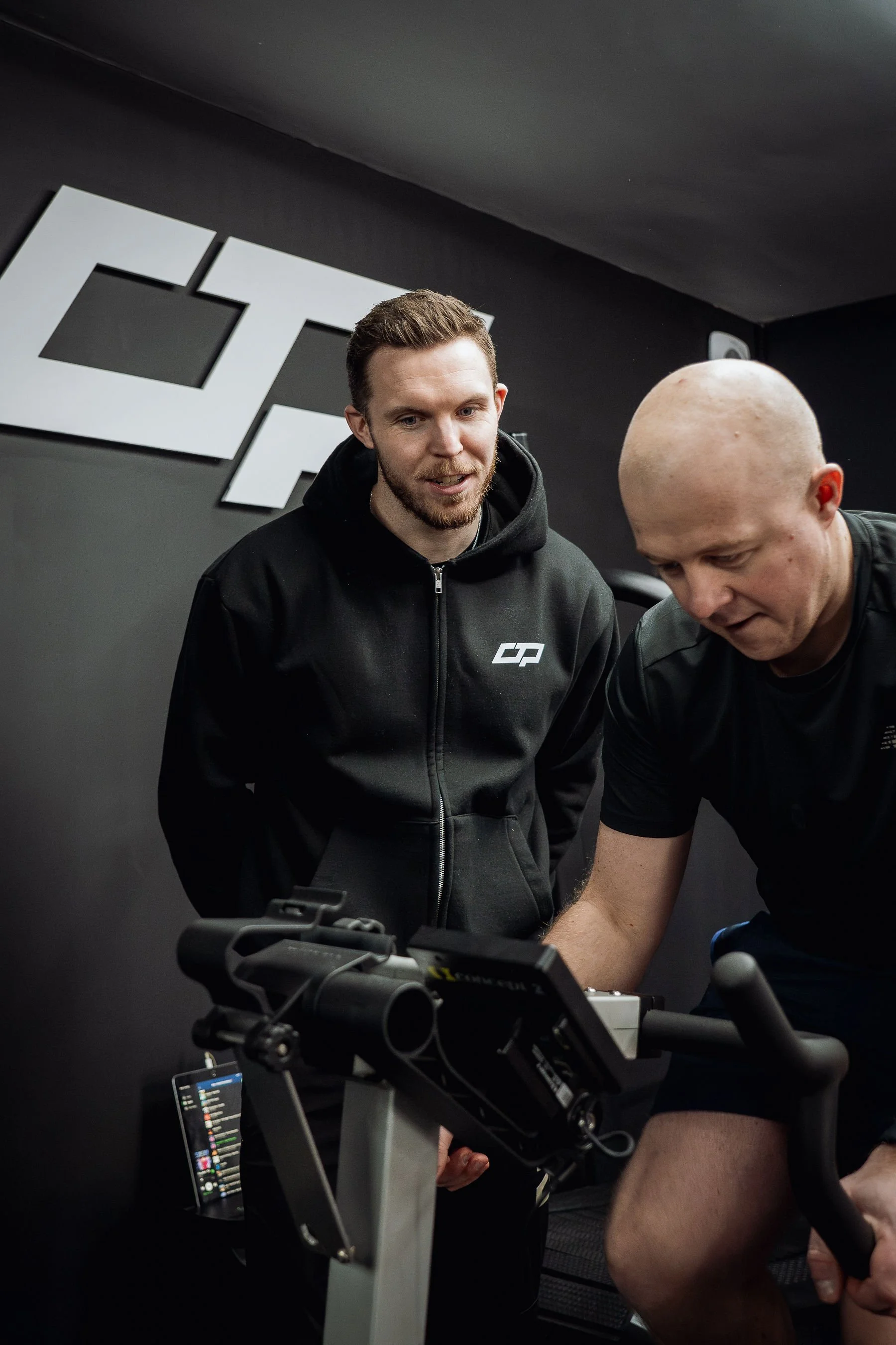 Members training together at CTP Training gym in Morpeth, with the CTP Training logo in the background.