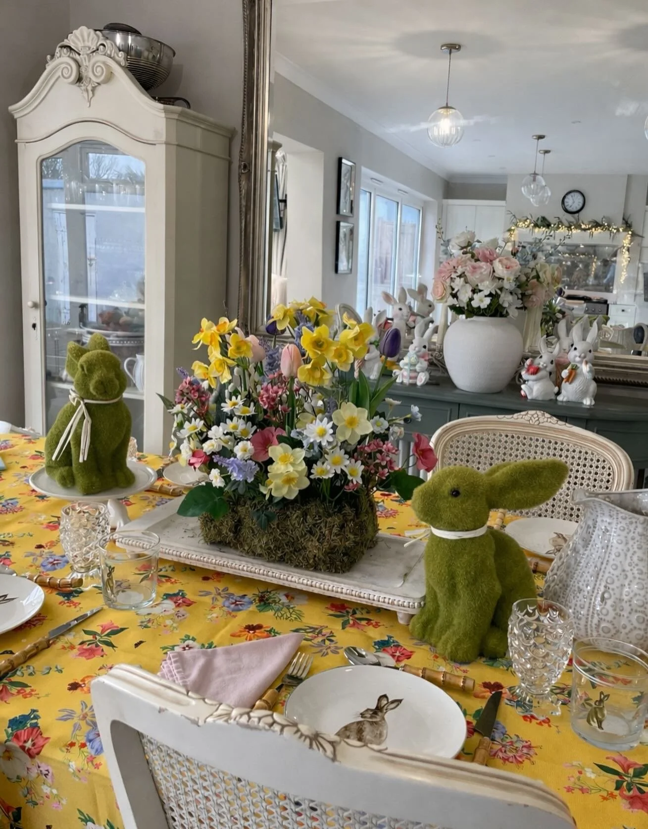 Afternoon everyone, loads of wreaths posted today and still more to post tomorrow. I love an Easter table and the Easter moss bricks(1 left) in the centre looks great with my green bunnies either side. This years table has a lot more colour than befo