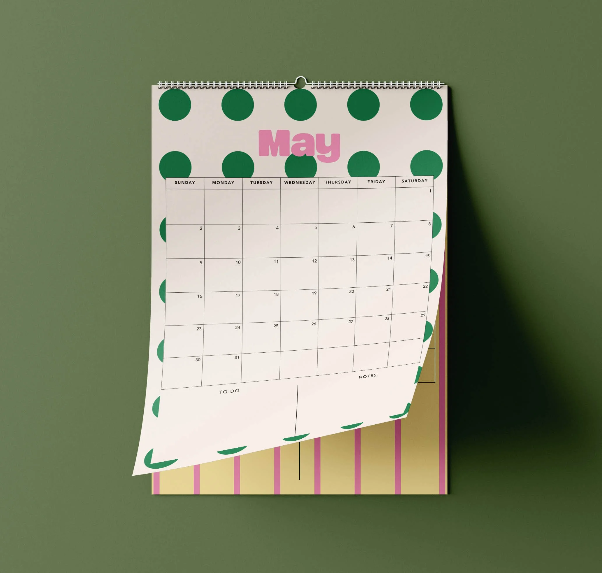 May 2027 page of the Sofe Store wall calendar with large green polka dots, a pink “May” heading, a Sunday-to-Saturday date grid and To Do and Notes sections