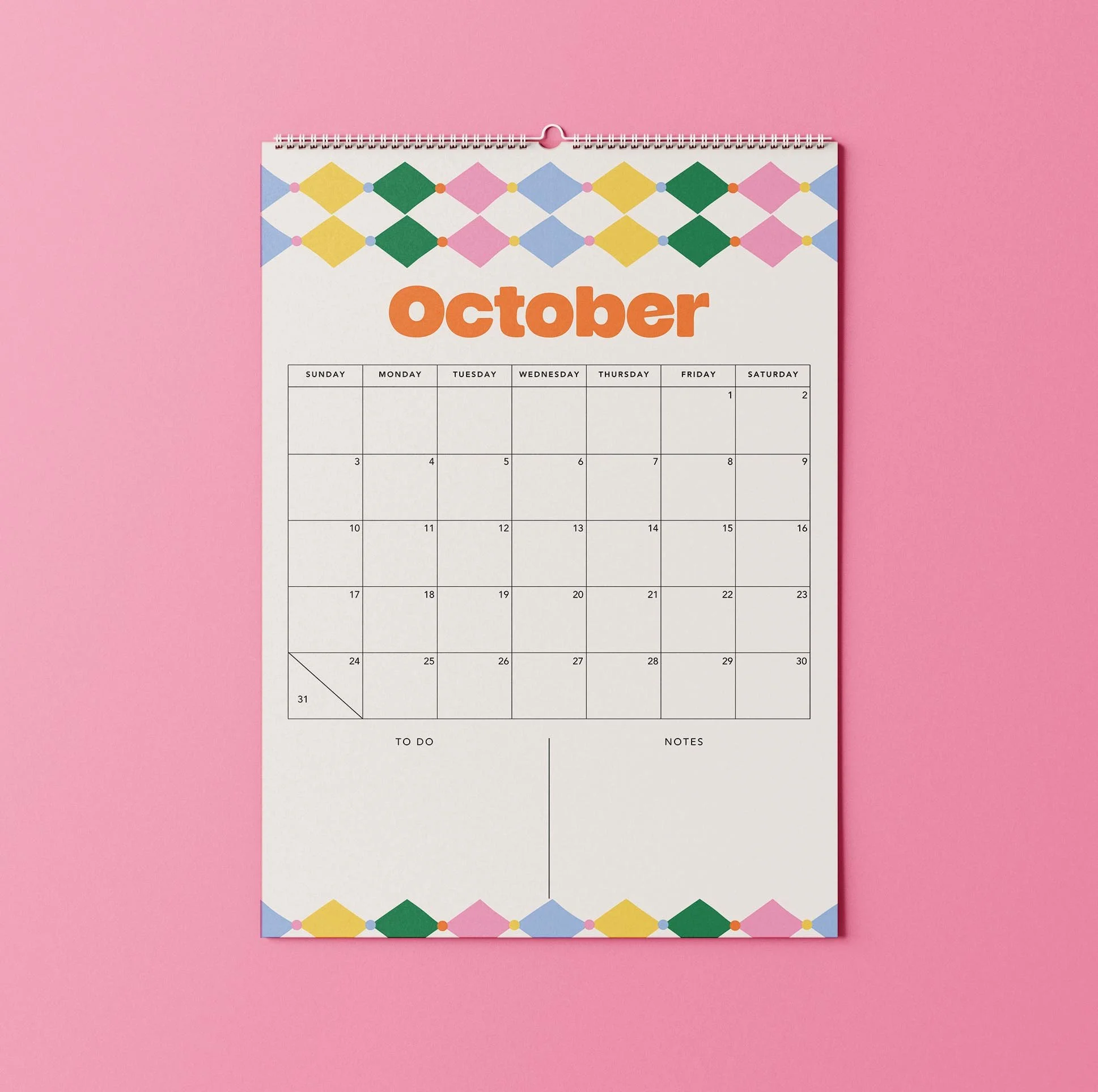 October 2027 page of the Sofe Store wall calendar with an orange “October” heading, rows of multicoloured diamonds at the top and bottom, and a spacious date grid