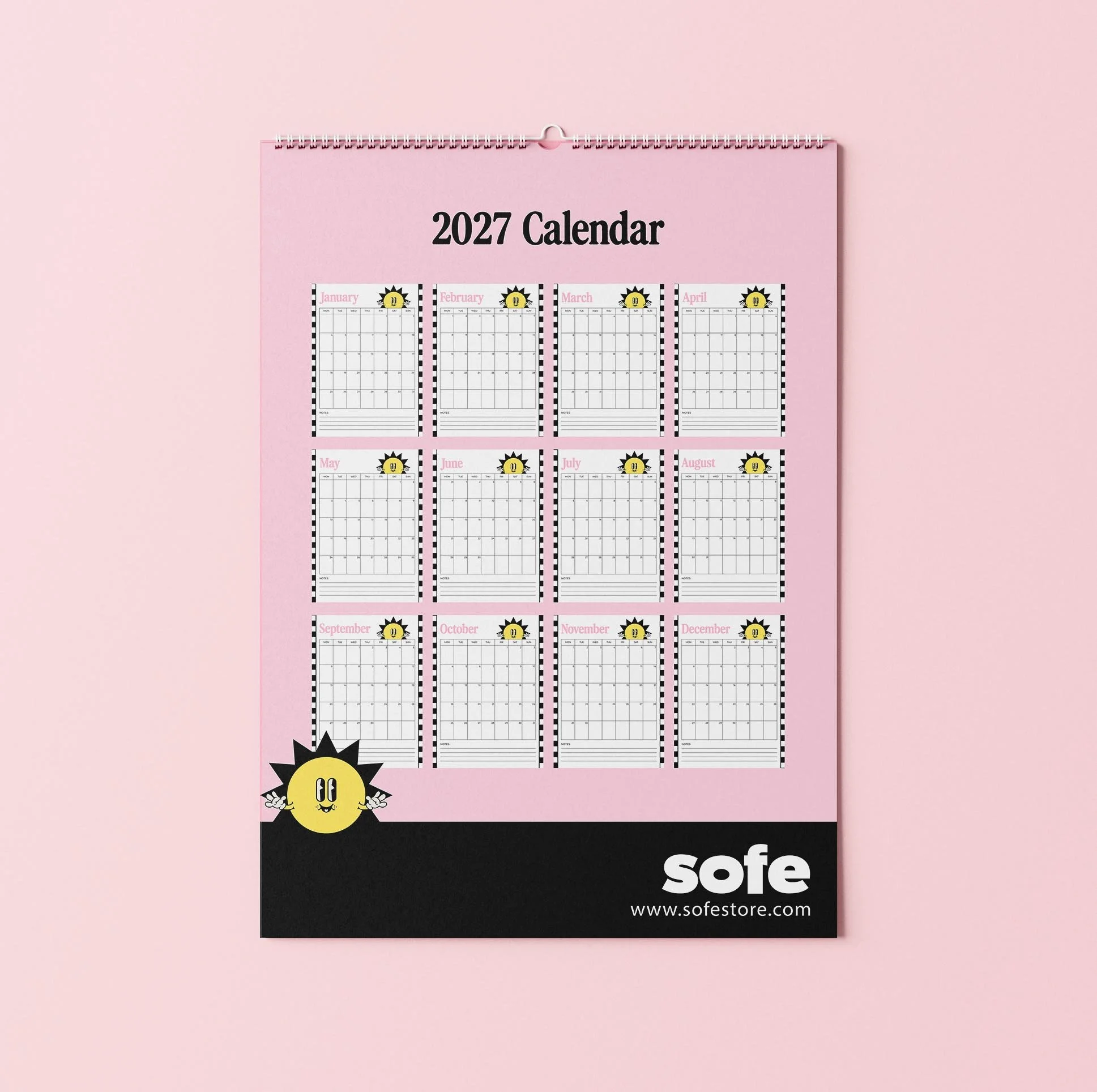Back page of the Sofe Store 2027 wall calendar on pink, showing a mini preview of all twelve months, each with a smiling sun and checkerboard edge, above a black band with the sun character