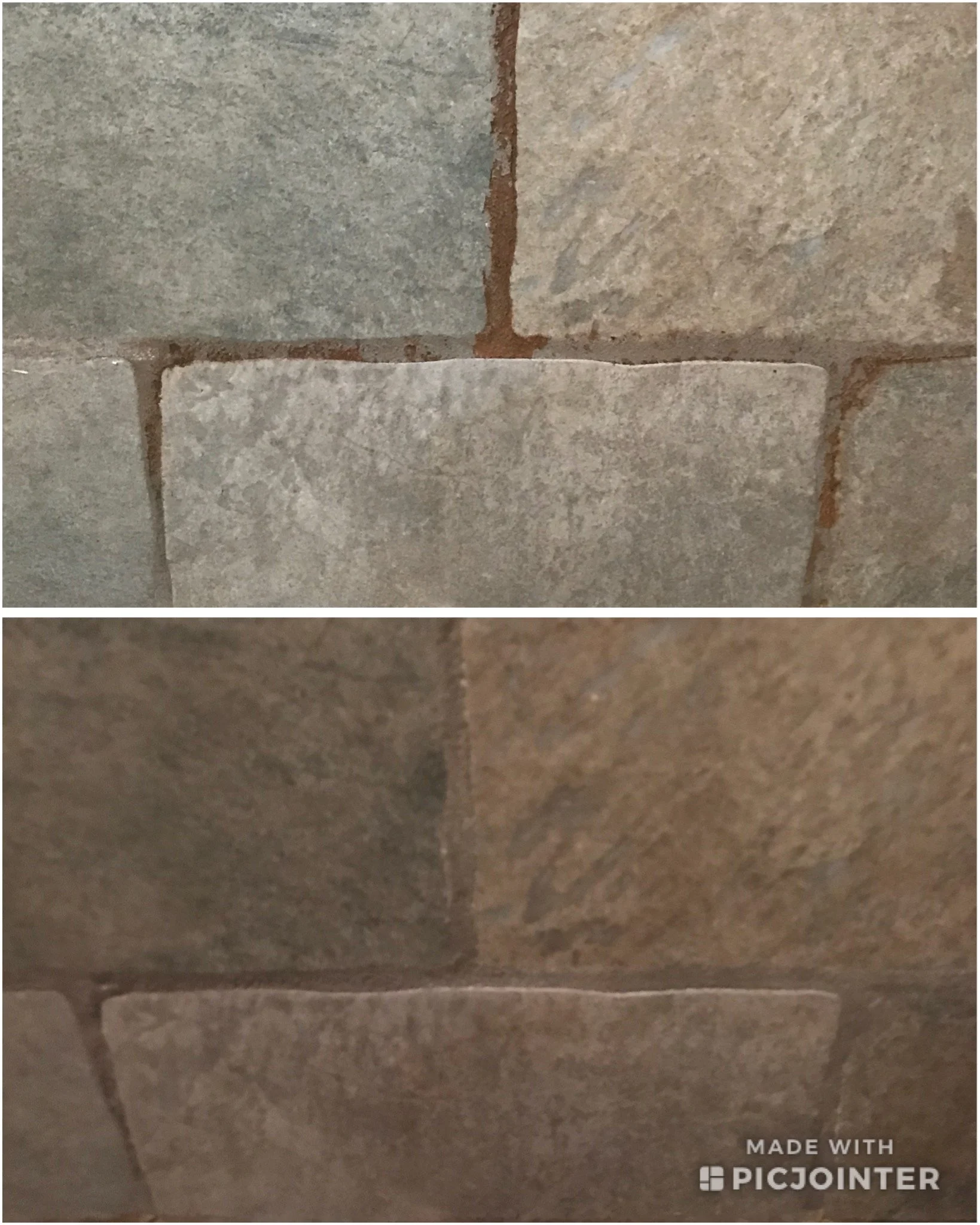Close-up of a brick wall with gray and tan bricks, showing mortar lines and texture of the bricks.