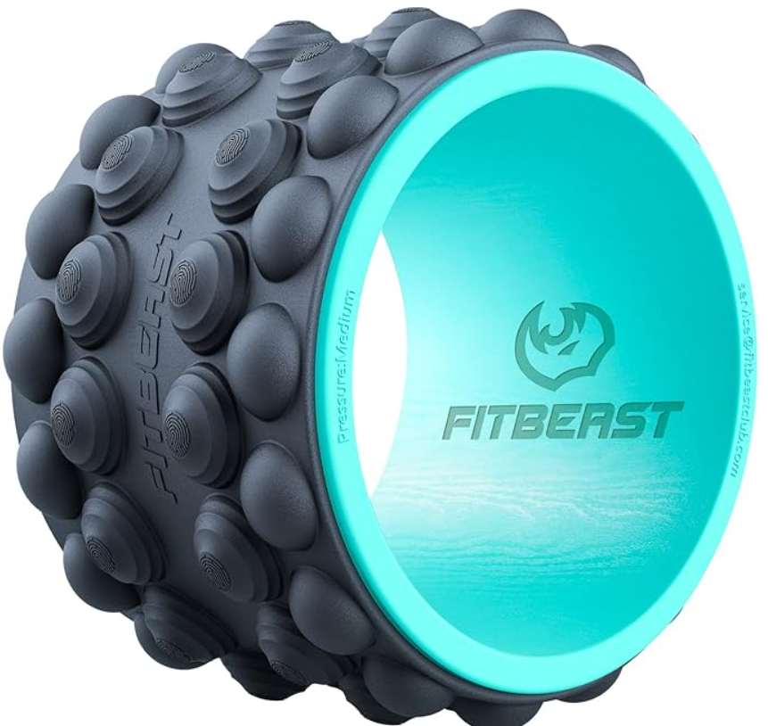 A black fitness massage roller with textured surface and glowing inner ring displaying the Fitbeast logo.
