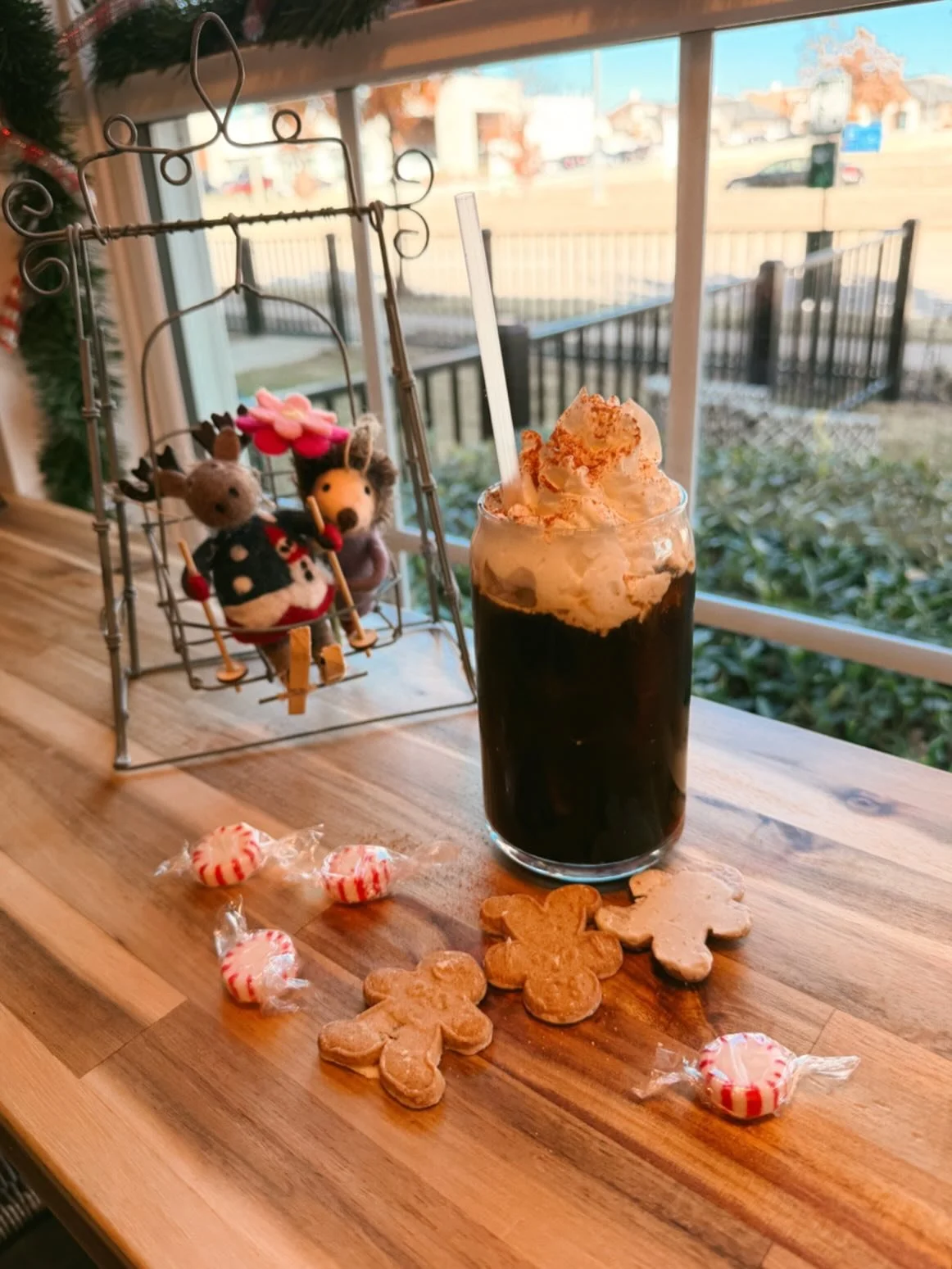 Festive sips alert! Caramel cold brew with gingerbread cold foam, topped with cinnamon and love 🎄☕️✨ available for a limited time! 

#coffee #localcafe #holidaydrinks