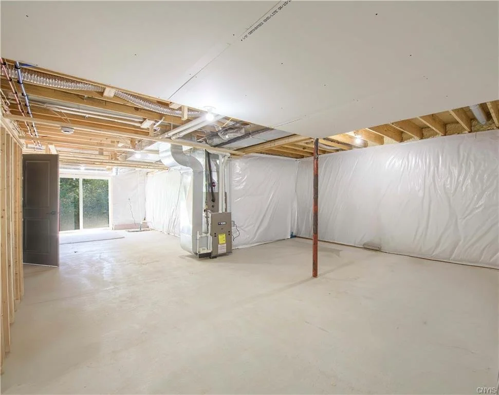 Unfinished basement - sliding door exit to yard