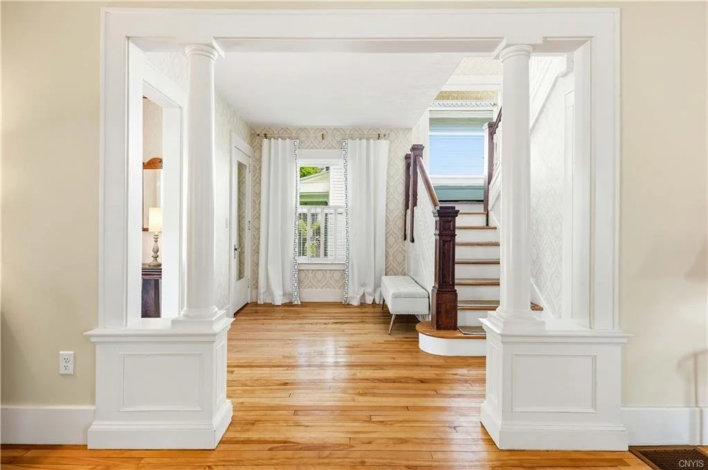 57elake-banister-foyer.jpeg