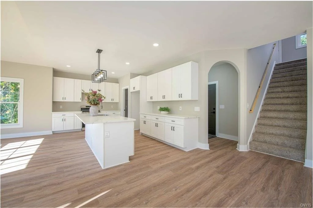 Kitchen and stairway to upstairs