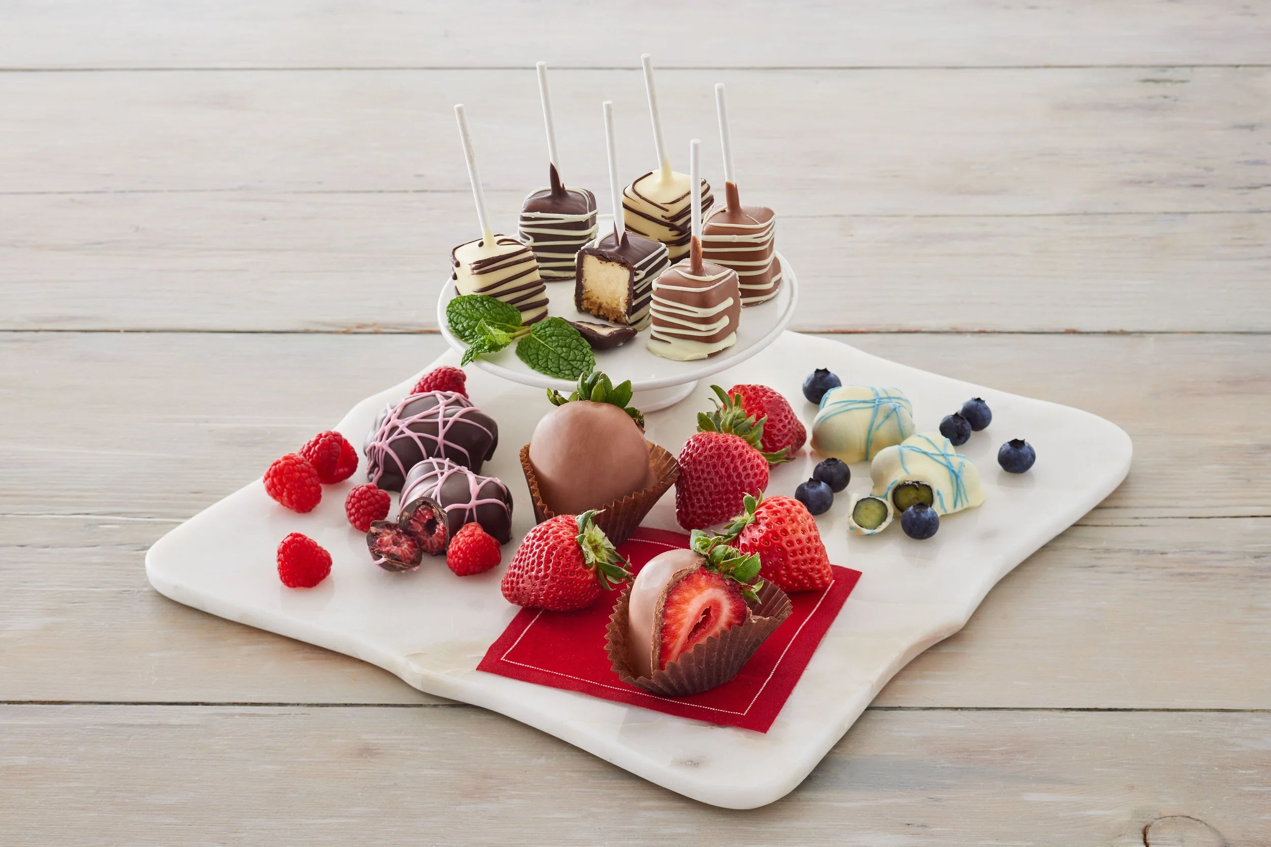 Belgian Chocolate-Dipped Fruit with Cheesecake Pops
