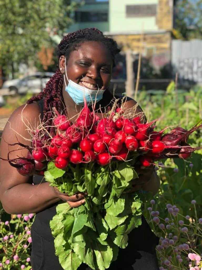 Whole Foods Market Foundation: Alleviating Global Poverty, Community First Grant: Groundwork Somerville, Lady with Radishes