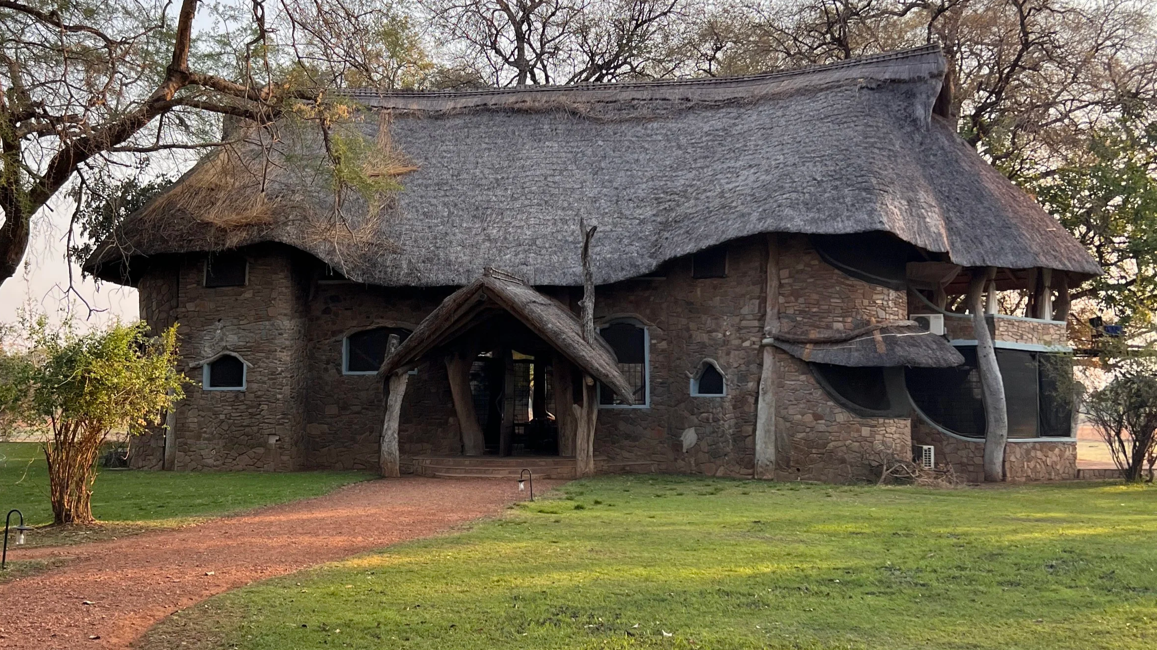 A large thatched safari house in Zambia