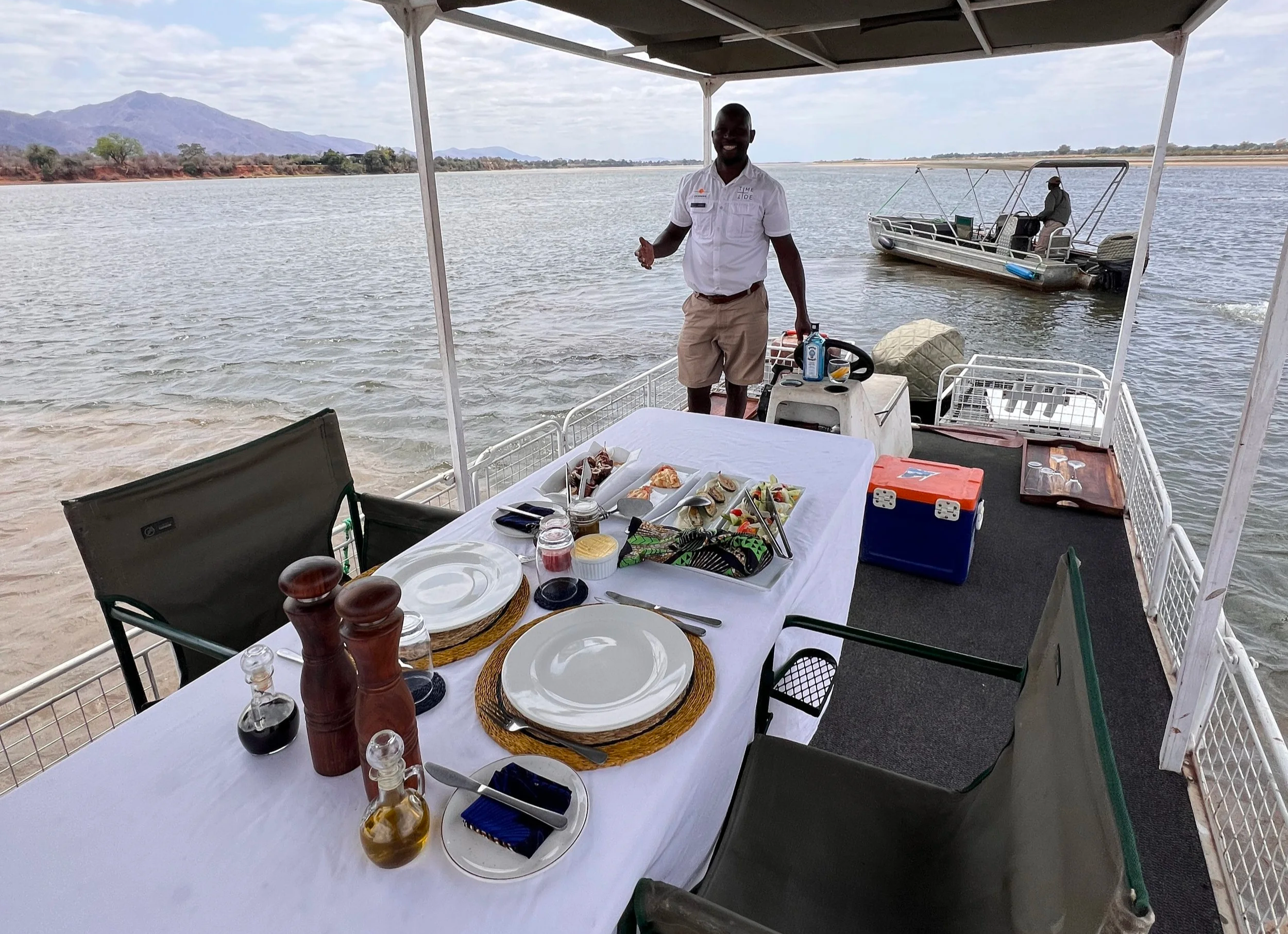 lunch setting on boat on river
