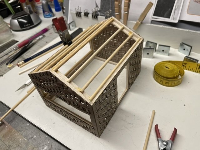 Constructing the bamboo hut.