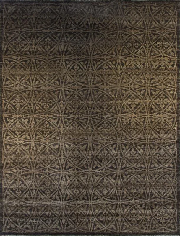 Close-up view of a patterned carpet with repeating geometric designs in shades of brown and beige.