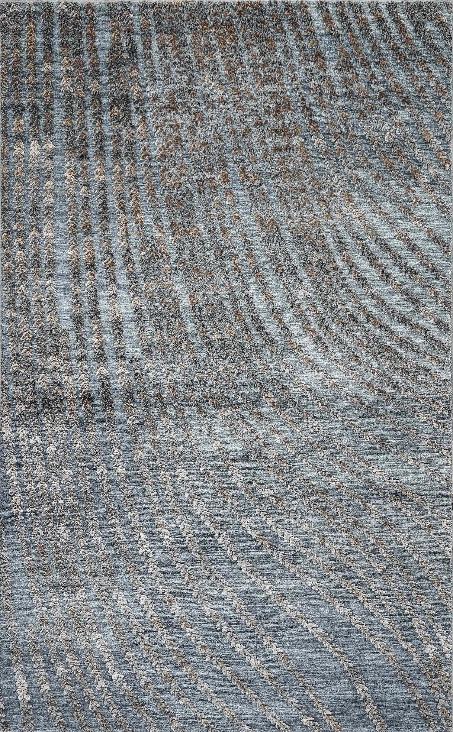 Gray carpet with a pattern of curving, parallel lines creating a textured design.