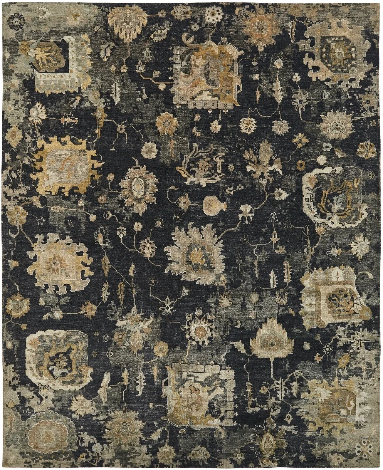 A dark-colored, ornate area rug with intricate floral and geometric patterns in shades of beige, gray, and gold.