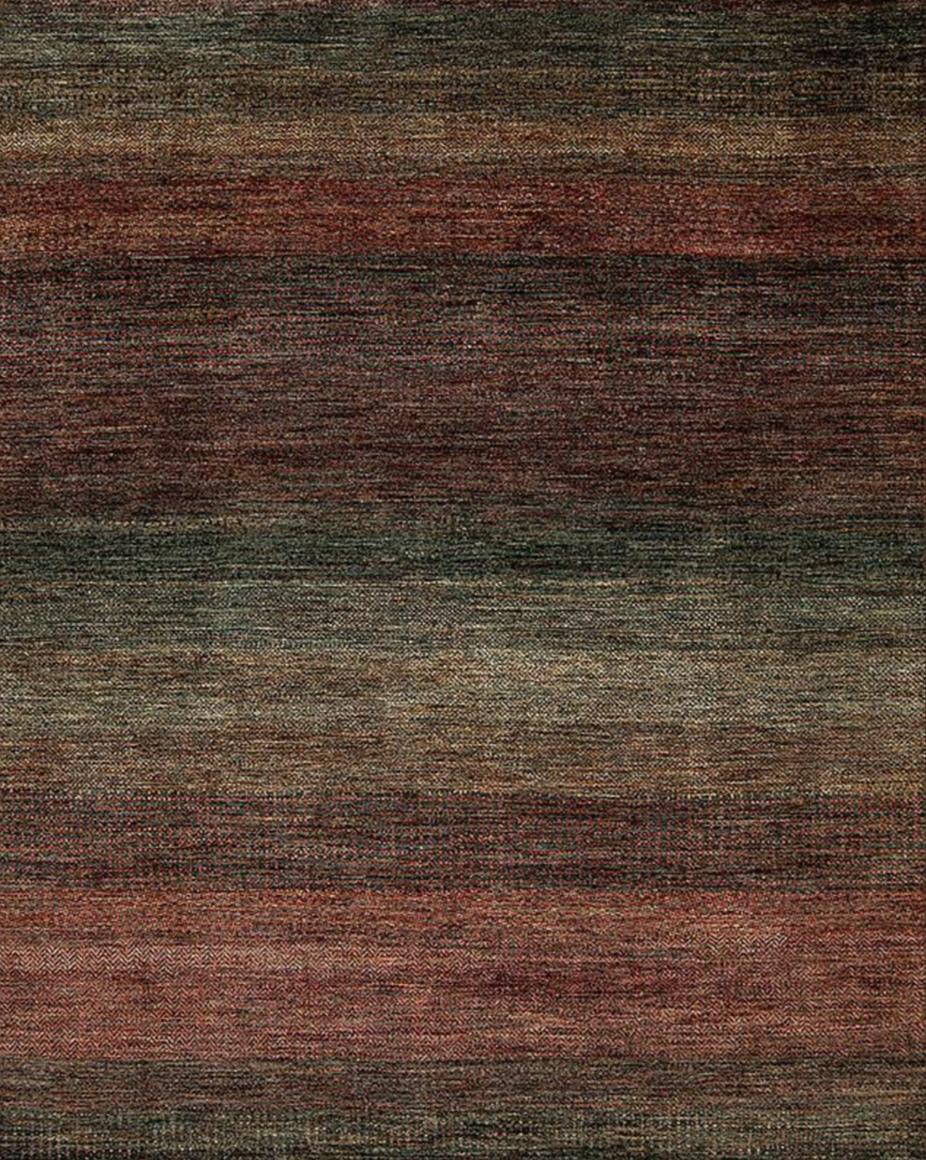 Close-up of a textured woven fabric with horizontal streaks of brown, red, and green colors.