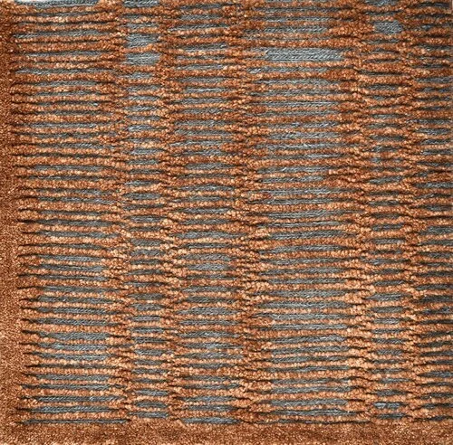 Close-up of a textured carpet with alternating tan and gray striped pattern.