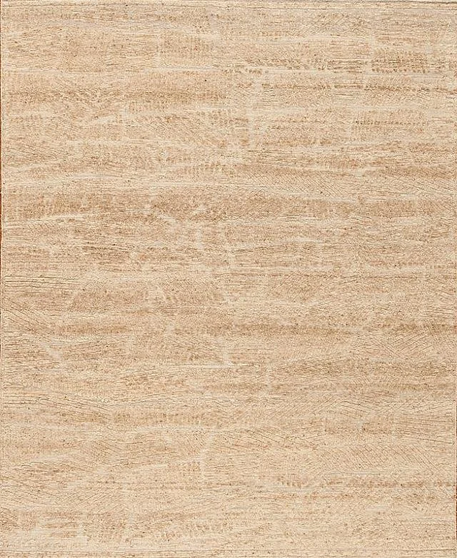 Close-up of a light-colored wooden surface with a textured grain pattern.