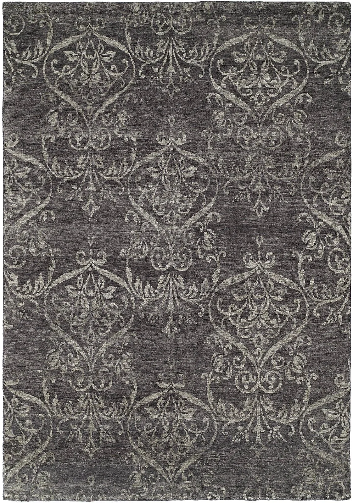 Patterned area rug with intricate floral and vine designs in shades of gray and cream.