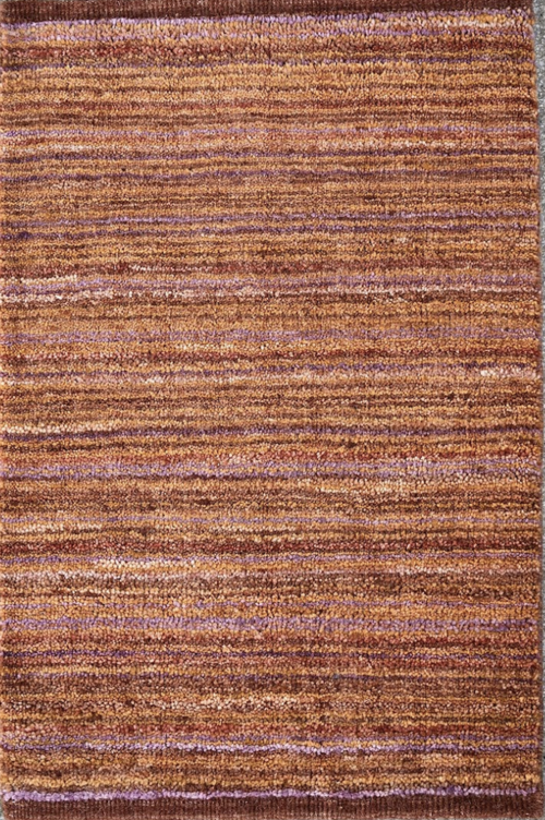 Multicolored striped rug with shades of orange, purple, and brown.