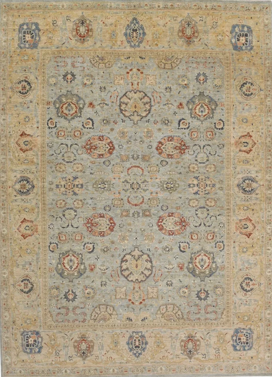 A traditional Persian-style area rug with a central medallion and floral motifs in shades of beige, blue, red, and ivory.