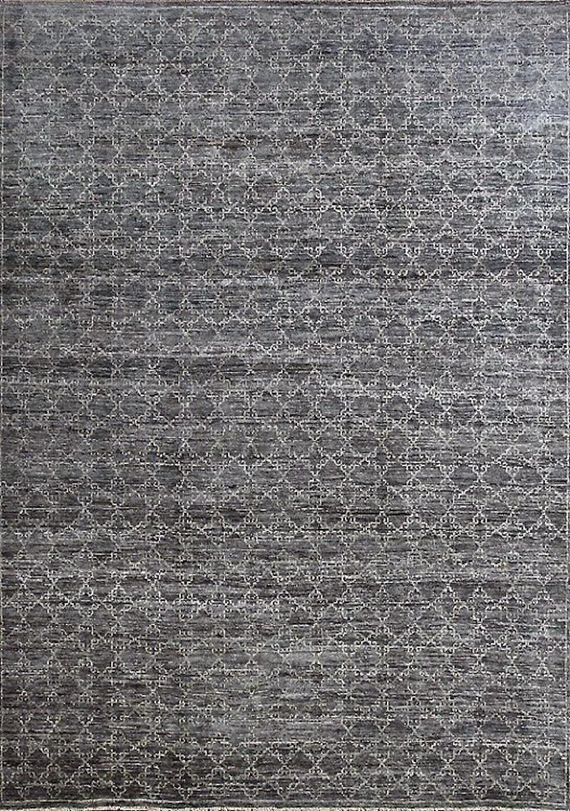 A patterned gray and beige carpet with a geometric floral design.
