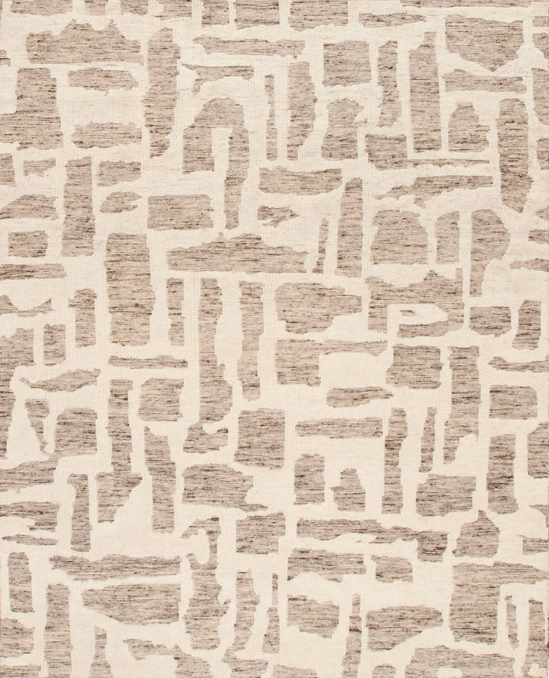 Beige and brown abstract patterned carpet or rug with irregular shapes and lines.