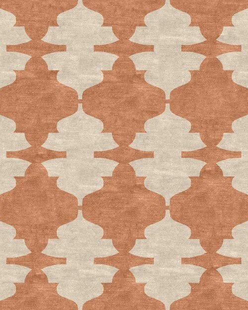 Patterned rug with a repeating geometric design in shades of beige and rust.