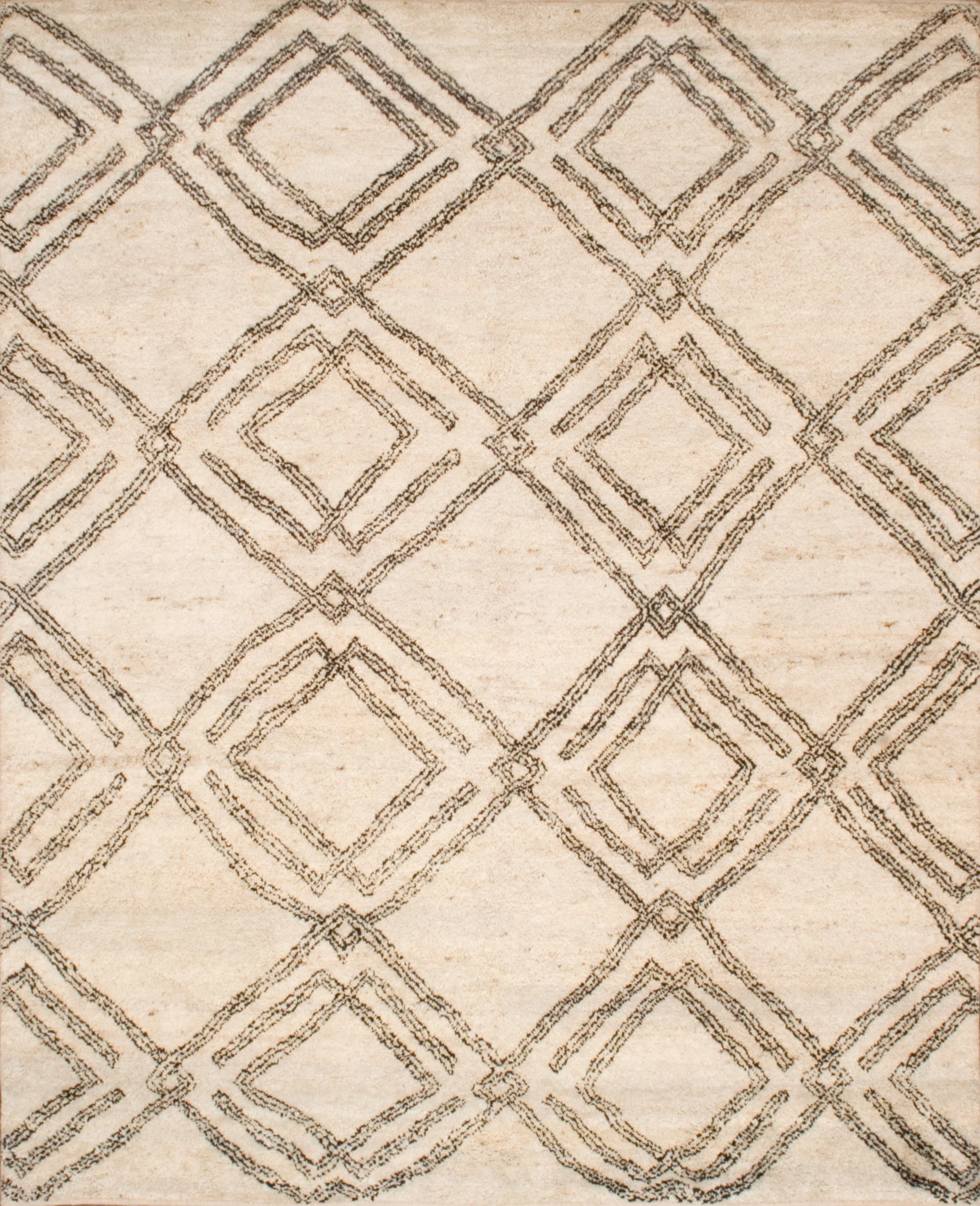 A beige rug with a geometric pattern of overlapping diamond shapes created by thin black lines.